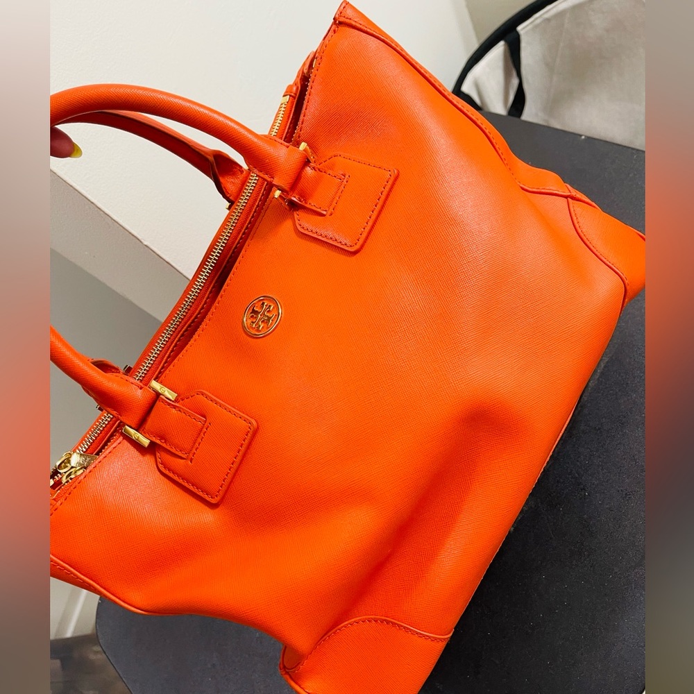 Tory burch Robinson double zip tote in Orange and pink inside.